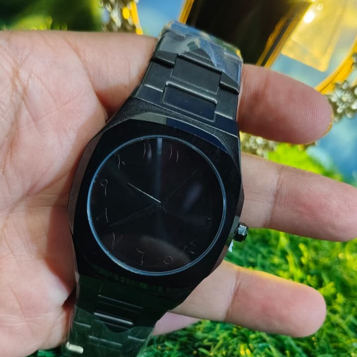 Close-up of Arabic numerals dial on Black Aura men’s watch