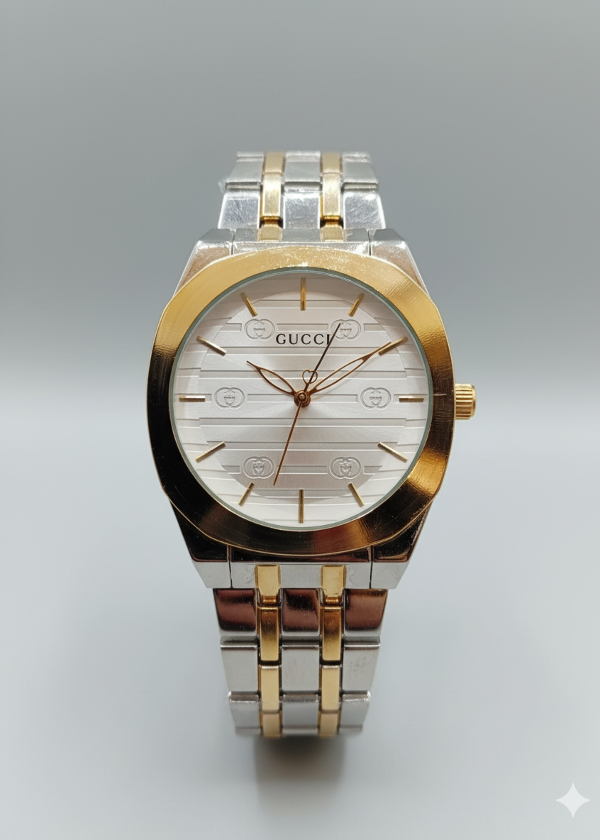 Gucci watch with two-tone metal band on a gray background