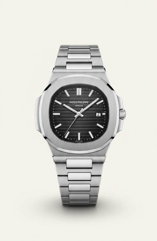Silver watch with black face on a white background